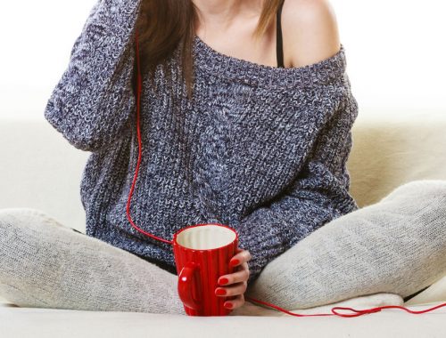 Woman holding coffee mug